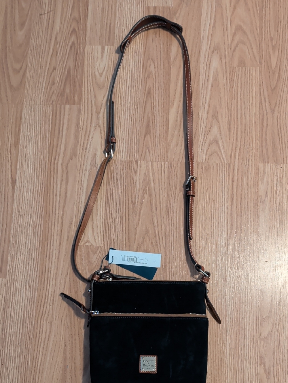 Dooney & Bourke Black Crossbody with Brown Strap